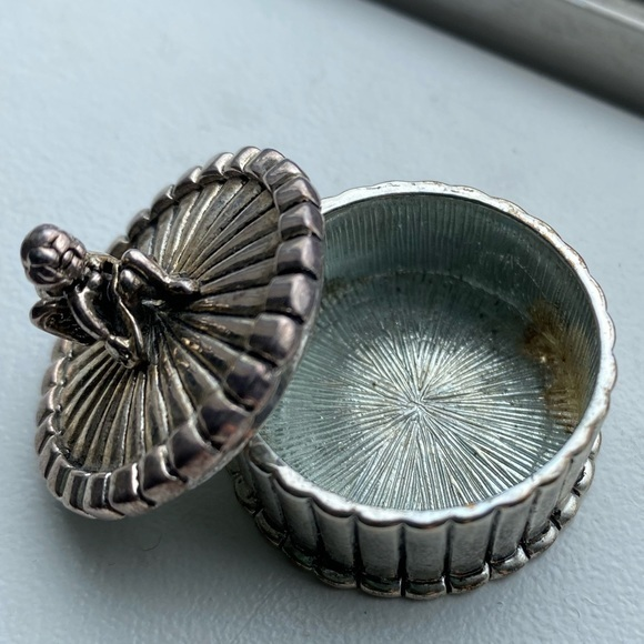 Tiny treasure box, silver round box with angel on top.‎ Size of a silver dollar. - Picture 1 of 4